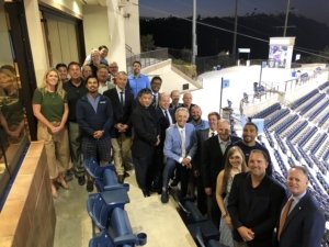 Pictured here is Dr. Ghosh with the USD athletic program and affiliated doctors at Fowler field on the USD campus.